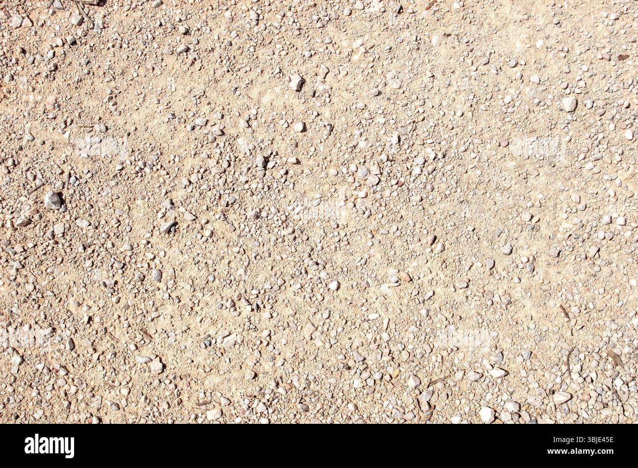 Texture de surface en gravier sec et terre pleine cadre. Banque D'Images