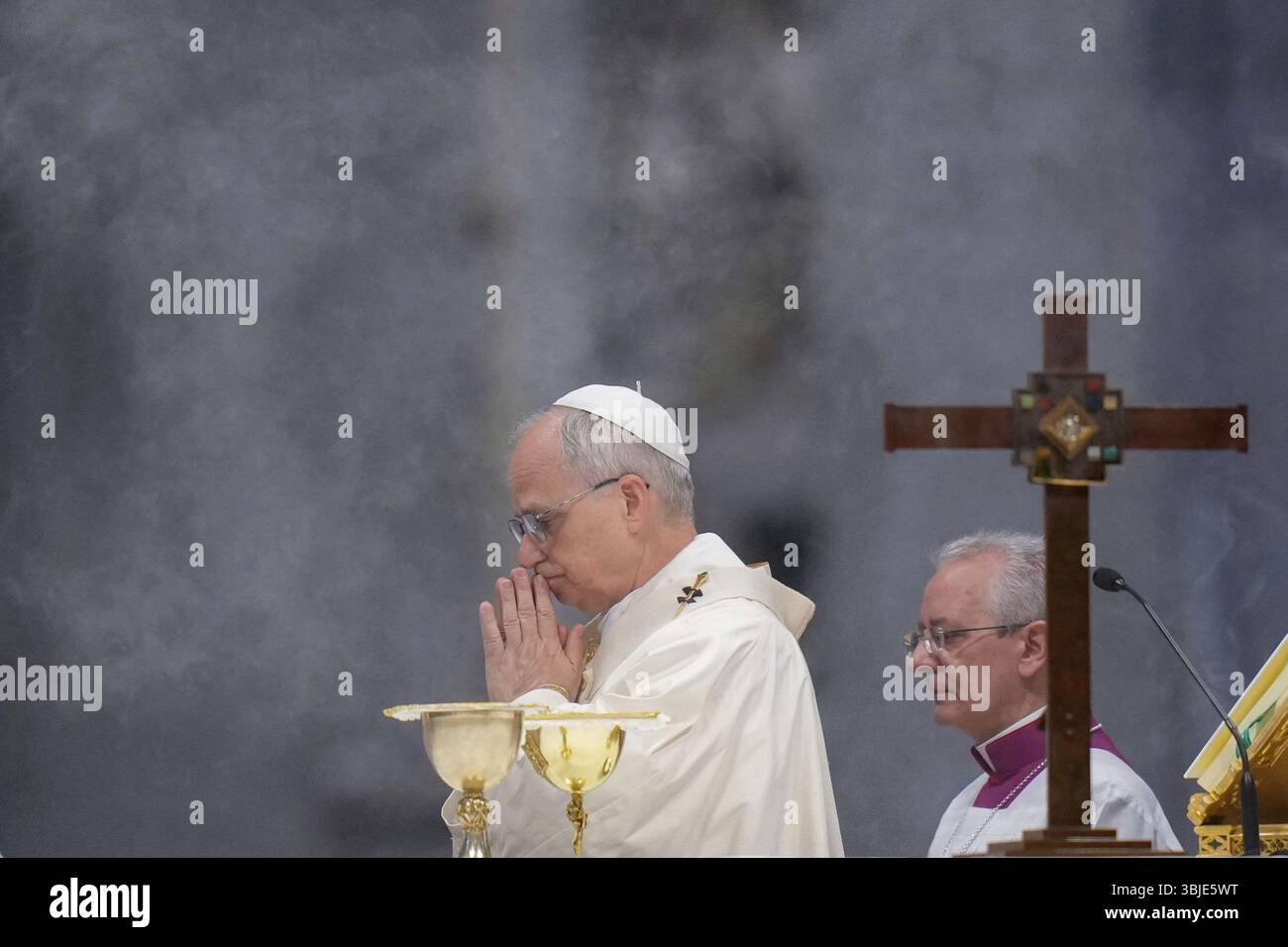 Pope Leo XIV, flanked by Vatican Master of Liturgical Celebrations ...