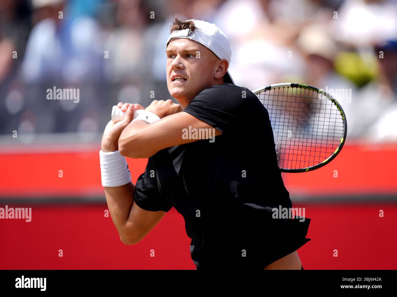 Holger Rune en action contre Christopher O'Connell le huitième jour des Championnats HSBC au Queen's Club de Londres. Date de la photo : lundi 16 juin 2025. Banque D'Images Holger Rune en action contre Christopher O'Connell le huitième jour des Championnats HSBC au Queen's Club de Londres. Date de la photo : lundi 16 juin 2025. Banque D'Images