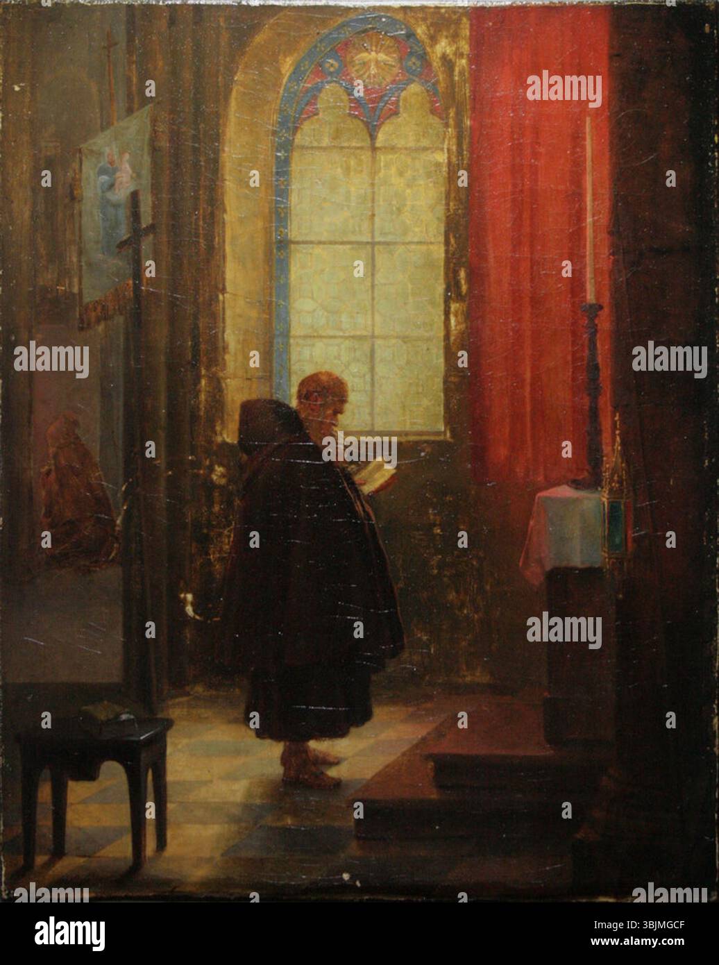 *Le moine* (1827) de Jean-Baptiste Goyet met en scène un moine en prière. Le tableau, qui pourrait faire partie de *une Chapelle*, marque les débuts de Goyet au salon de Paris, mettant en valeur son habileté dans les sujets religieux et spirituels. Banque D'Images