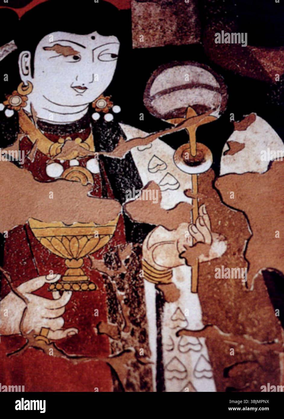 La 'figure d'un banquet' de Balalyk Tepe, datant du vie au VIIe siècle, est une fresque qui représente une scène de banquet. L'œuvre d'art est un exemple significatif de l'art des débuts de l'Asie centrale, mettant en vedette des personnages assis à un festin somptueux. Banque D'Images