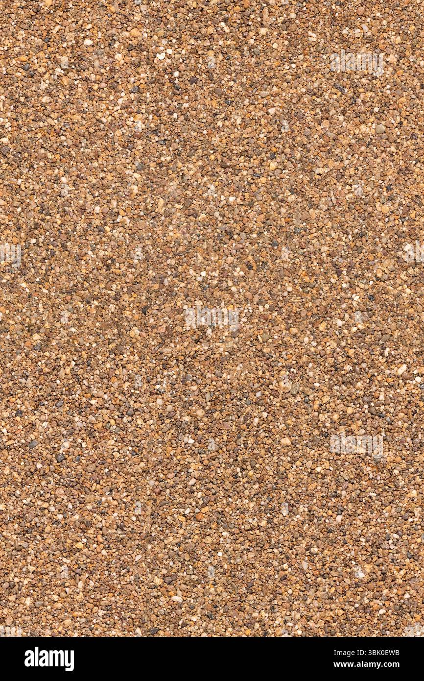 Texture de fond sans couture de plancher d'agrégat de galets de pierre. Vue de dessus d'une texture de sol de grande surface pierreuse. L'image peut être mise en mosaïque pour créer une image plus grande Banque D'Images