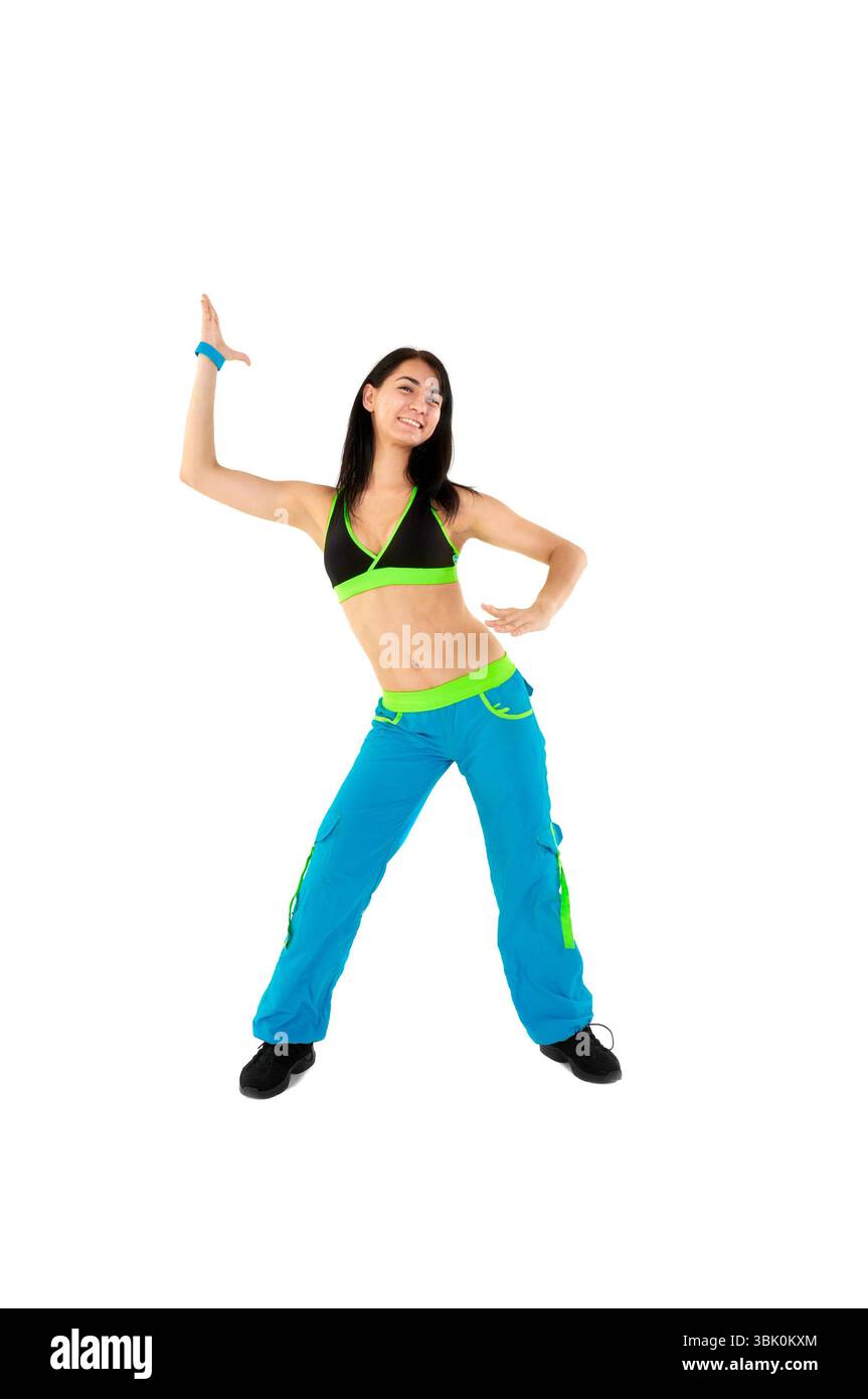Jeune instructeur de fitness sur fond blanc en studio Banque D'Images