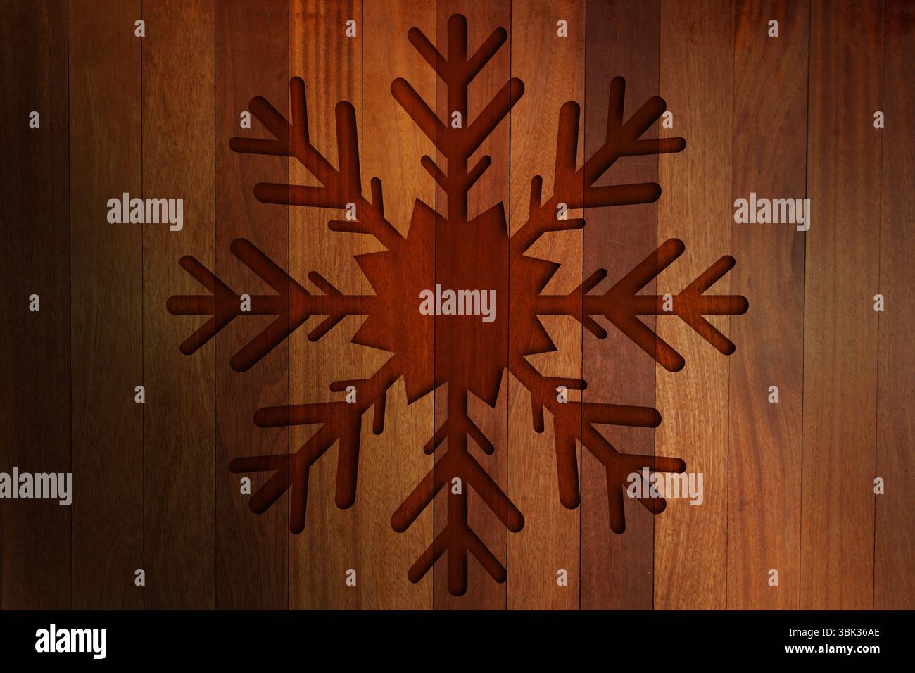 Dessin plat flocon de neige à six bras sculpté dans des planches de bois verticales marron mettant en valeur le grain Banque D'Images