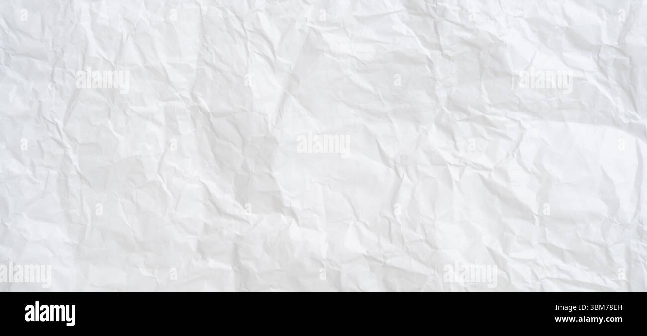 Vue de dessus et plein cadre de texture de papier blanc froissé ou froissé est utilisé comme texture de fond de papier blanc froissé dans le travail d'art décoratif. Banque D'Images
