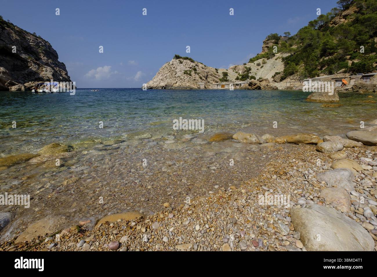 Es Portitxol plage, crique en pierre, municipalité de Sant Joan de Labritja, Ibiza, Îles Baléares, Espagne, Europe Banque D'Images