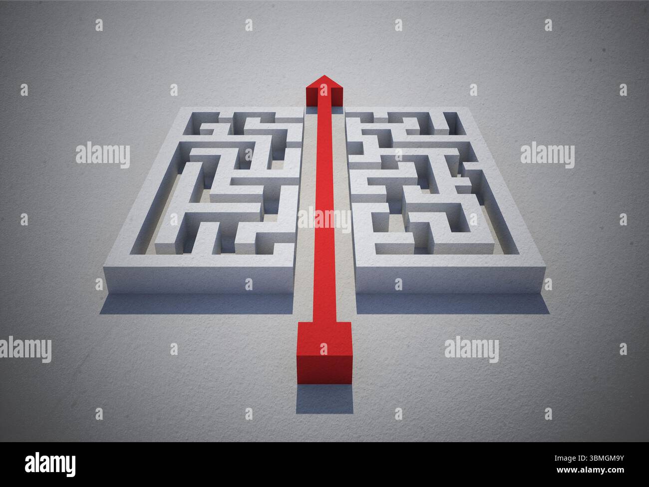 Flèche rouge coupant à travers puzzle Banque D'Images