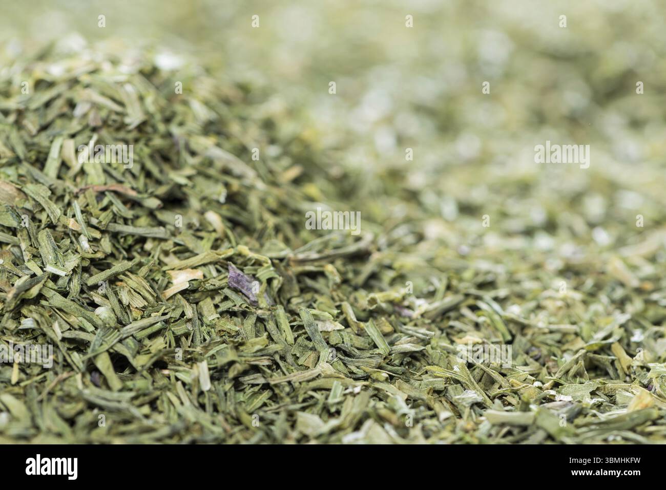 La ciboulette séchée de droit pour l'utilisation d'arrière-plan ou comme texture Banque D'Images