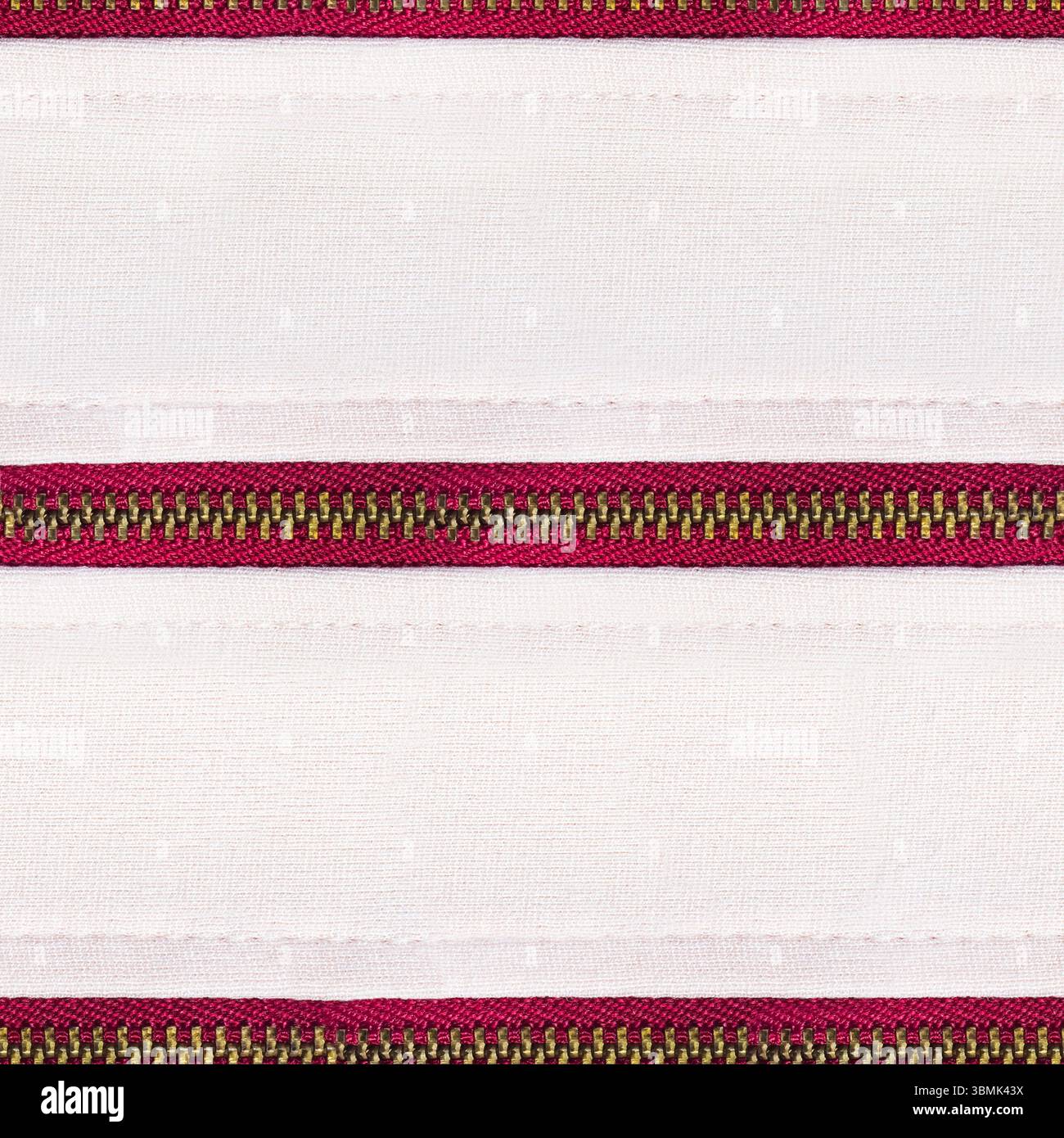 Texture photo 4K sans couture de sangles en coton cousues de couleur blanche avec des fermetures à glissière en métal rouge. Banque D'Images
