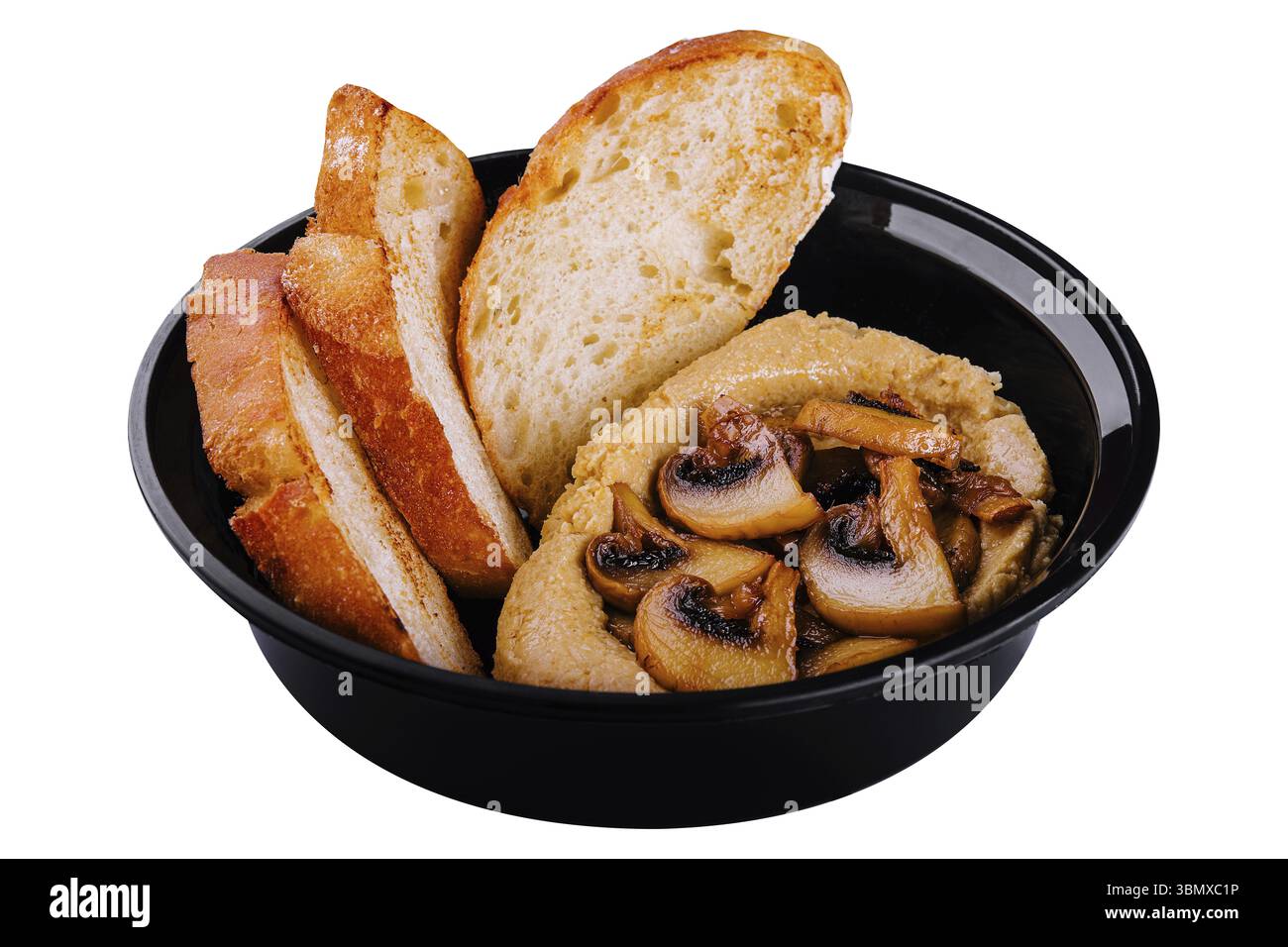 Nature morte, houmous avec champignons frits et pain Banque D'Images