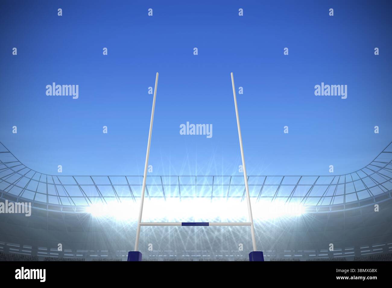 Poteau de but métallique s'élevant dans un stade plat, les projecteurs brillent au-dessus des étages vides et des fermes Banque D'Images