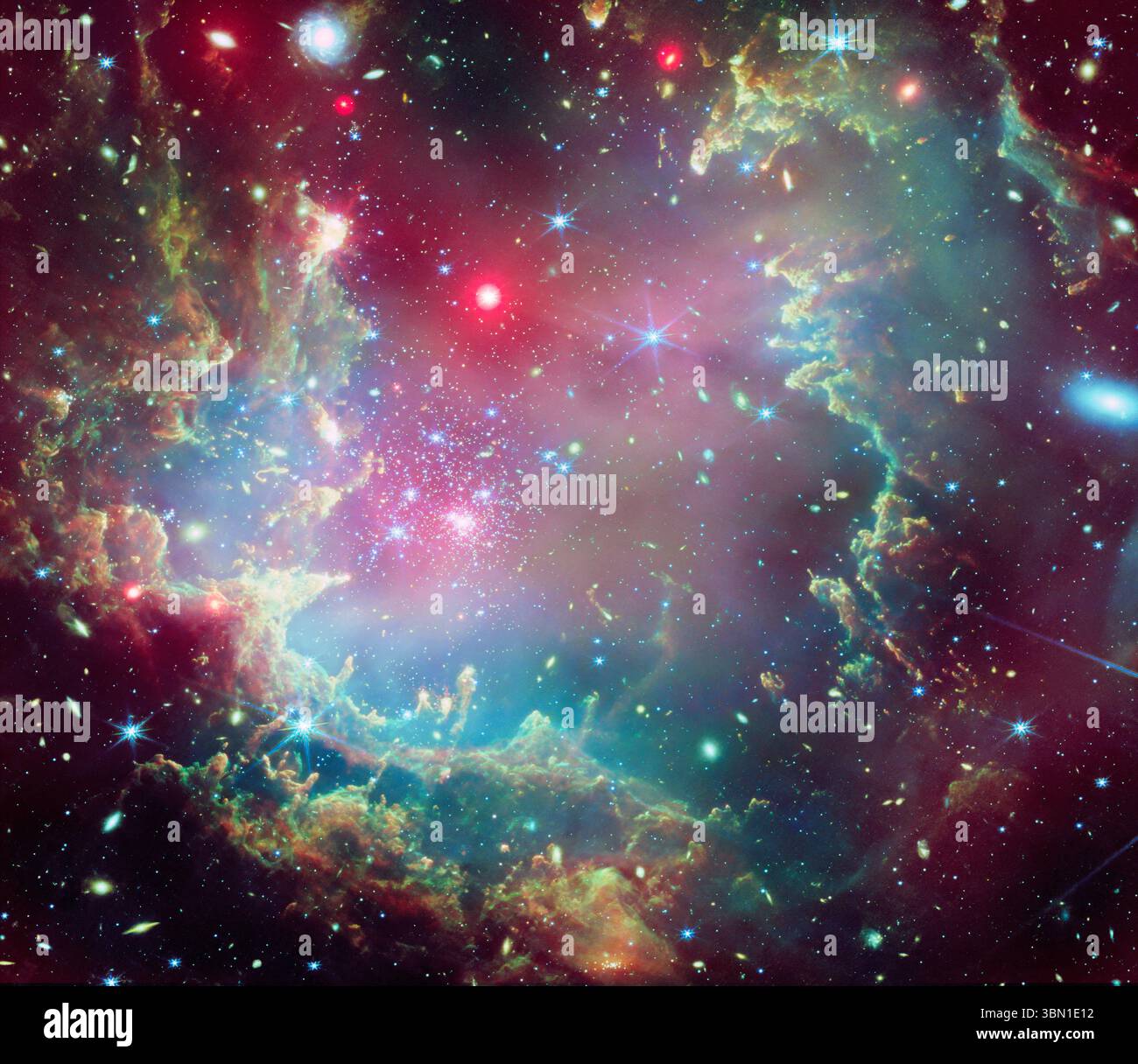 Paysage cosmique coloré. NGC 602 étoiles cluster SMC, vue Hubble. Image reproduite avec l'aimable autorisation de la NASA. Banque D'Images