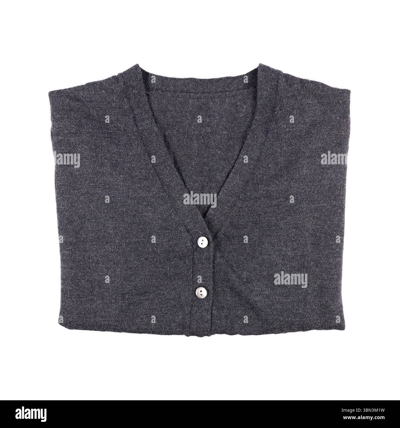 il s'agit d'un pull plié avec des boutons isolés sur blanc. Banque D'Images