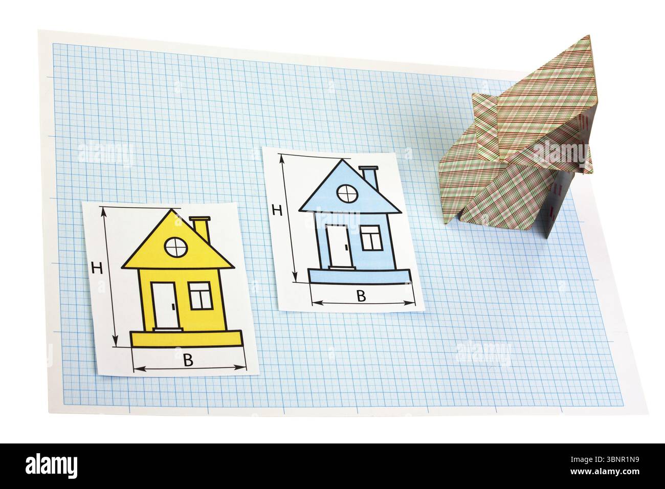 Dessins de développement et maison de cartes sur papier millimétré Banque D'Images