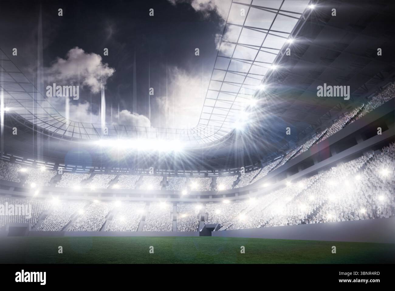 L'intérieur plat du stade montre des supports en acier tenant des projecteurs au-dessus du terrain vert Banque D'Images