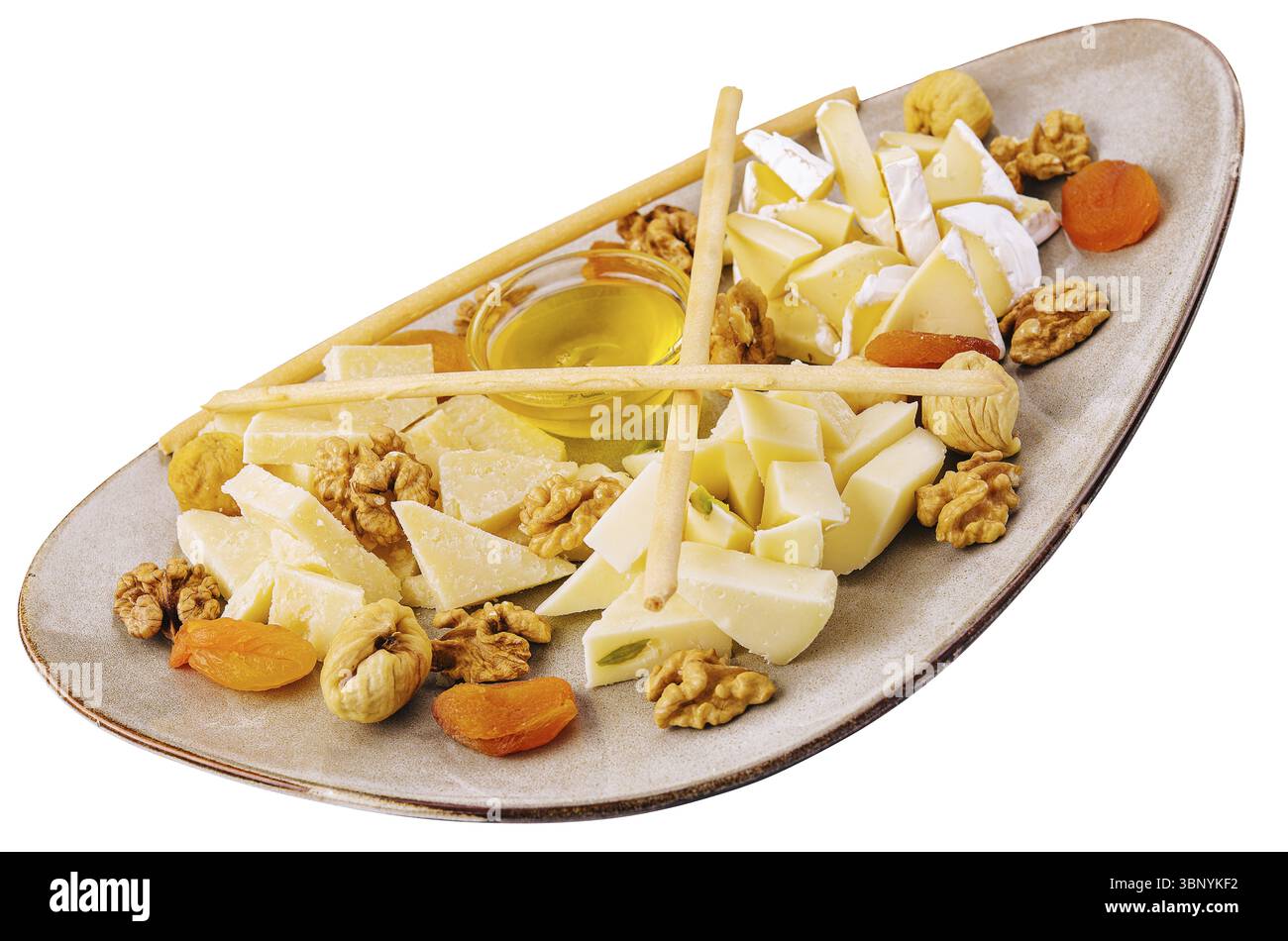 Nature morte, assiette de fromage aux noix et au miel Banque D'Images