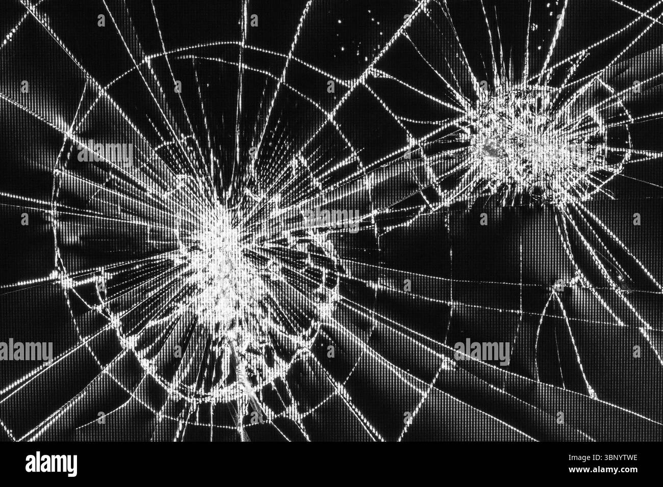 Traces de bosses et de fissures sur un écran LCD cassé, moniteur d'ordinateur ou TV, photo noir et blanc, photo noir et blanc Banque D'Images