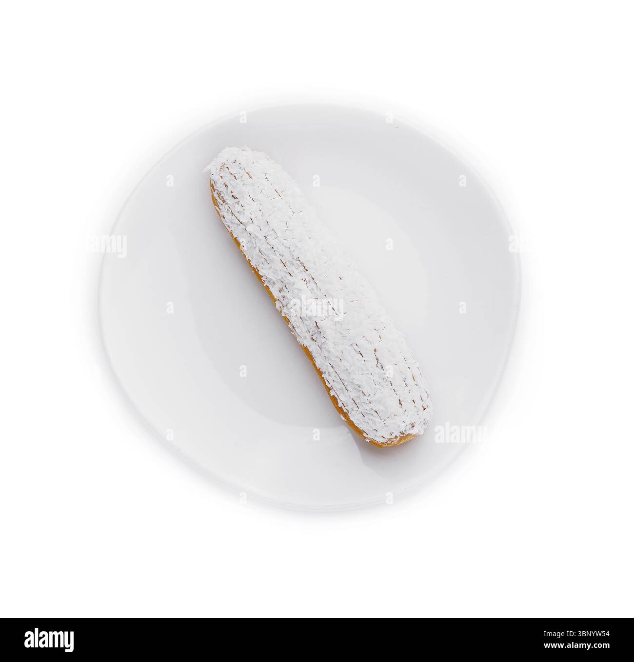 Eclair en glaçage blanc et flocons de noix de coco Banque D'Images