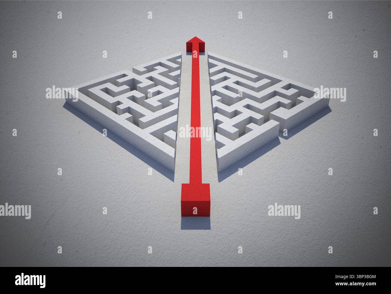 Flèche rouge coupant à travers puzzle Banque D'Images