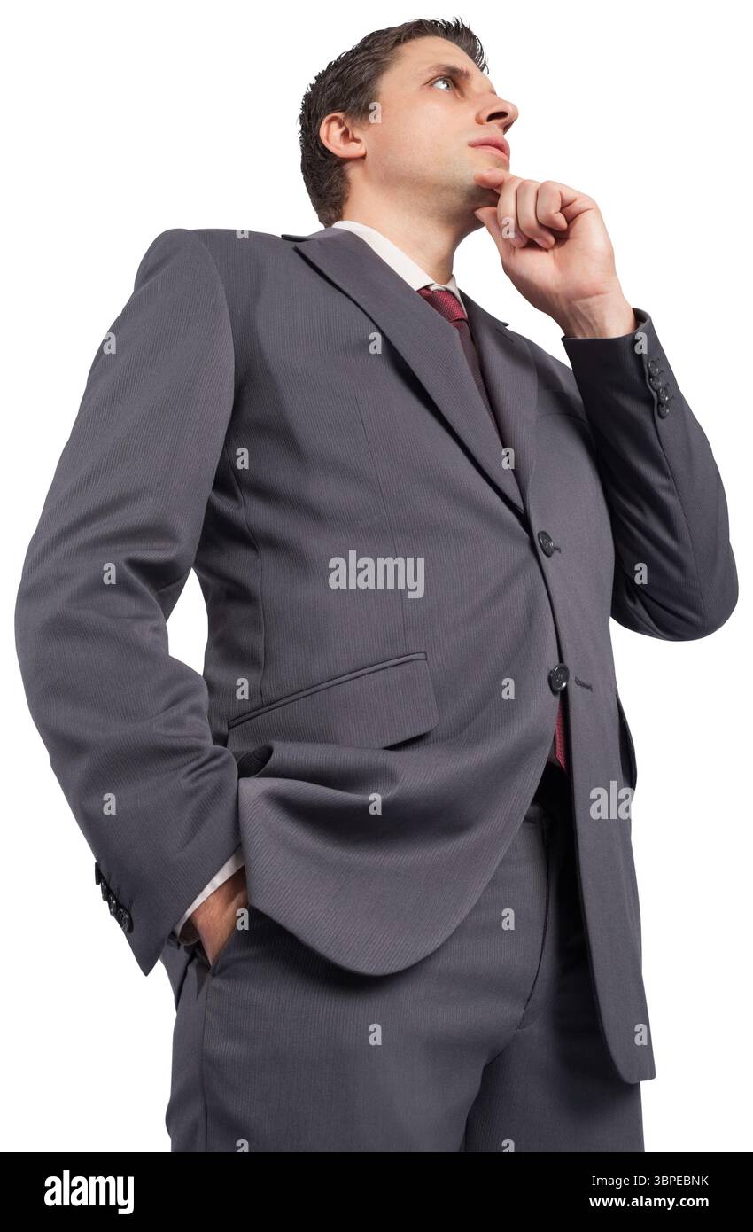 Thoughtful businessman with hand on chin Banque D'Images