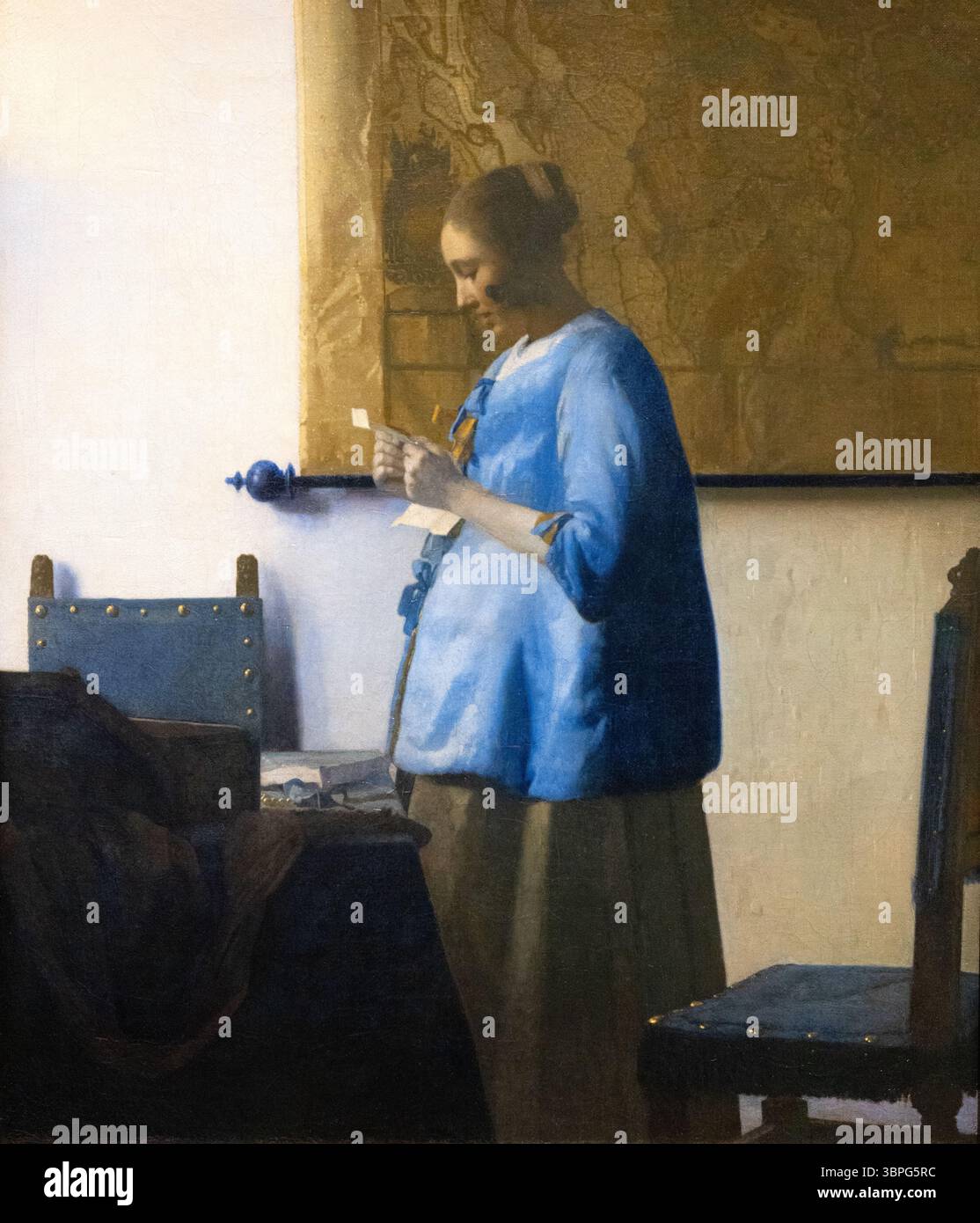 Peinture de Johannes Vermeer ; 'femme lisant une lettre' 1663, huile sur toile, peinture néerlandaise de l'âge d'or du XVIIe siècle du style de vie des années 1600 Banque D'Images
