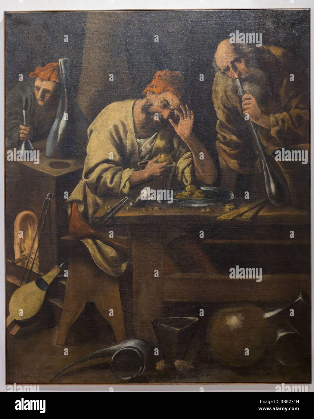 Trois alchimistes travaillant avec des outils dans un laboratoire, peint par Pietro della Vecchia, 1639, Museo Civico degli Eremitani, Padoue, Italie. Banque D'Images
