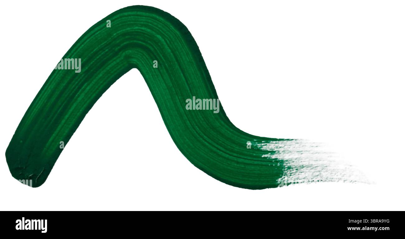 Un trait de peinture vert audacieux coule élégamment sur une surface blanche, mettant en valeur l'art artistique. Banque D'Images