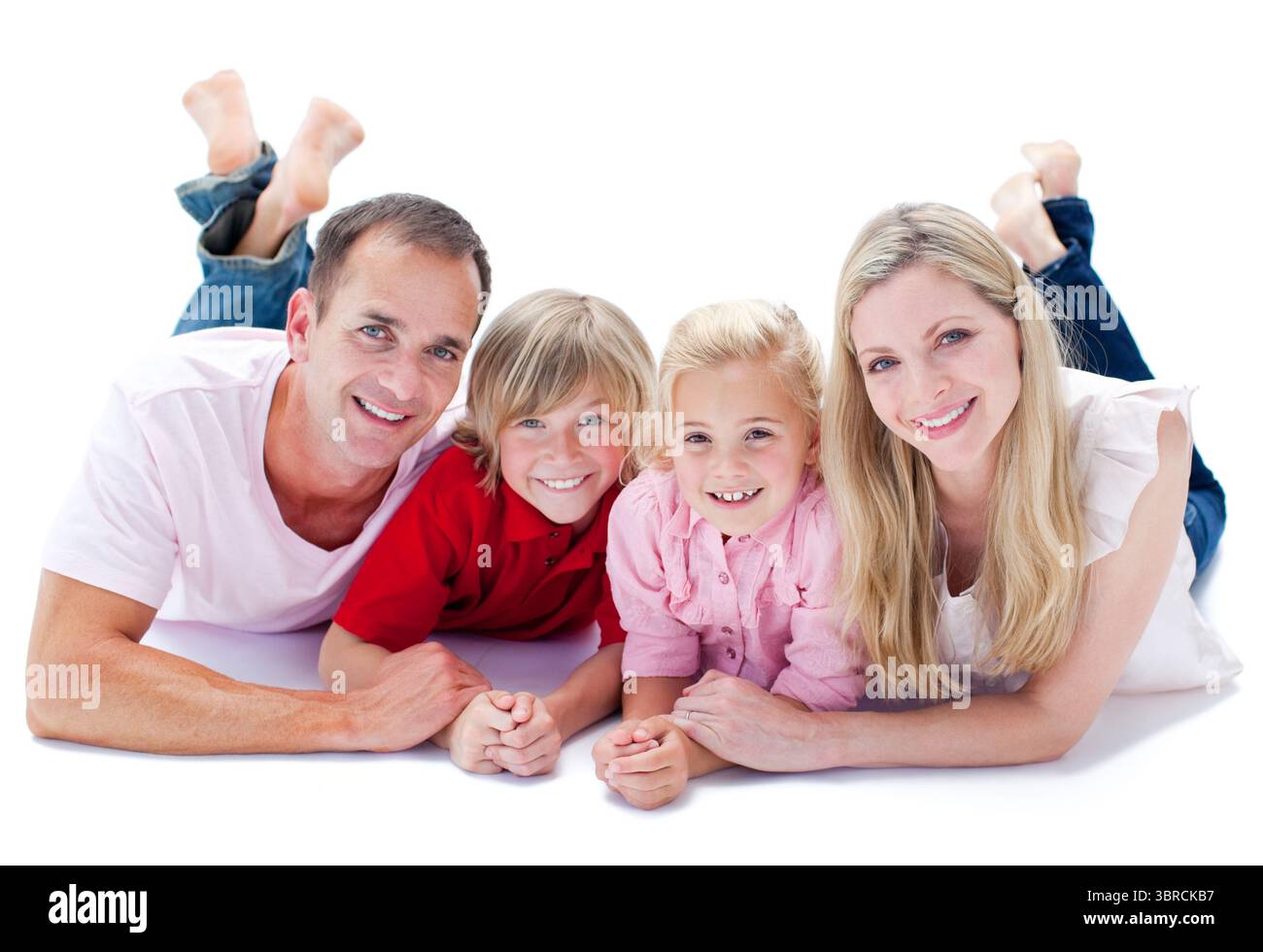Portrait de famille se trouvant sur le plancher Banque D'Images