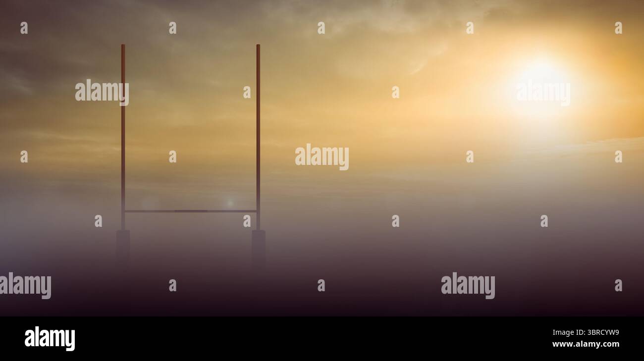 Émergeant dans la brume, poteaux de but en forme de H debout sur un champ ouvert, le soleil brille à travers des nuages éparpillés Banque D'Images Émergeant dans la brume, poteaux de but en forme de H debout sur un champ ouvert, le soleil brille à travers des nuages éparpillés Banque D'Images