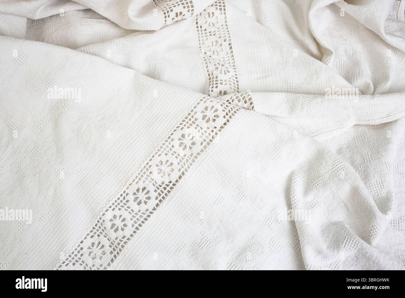 Tissu de table à motifs vintage, tissu blanc plis toile de fond Banque D'Images