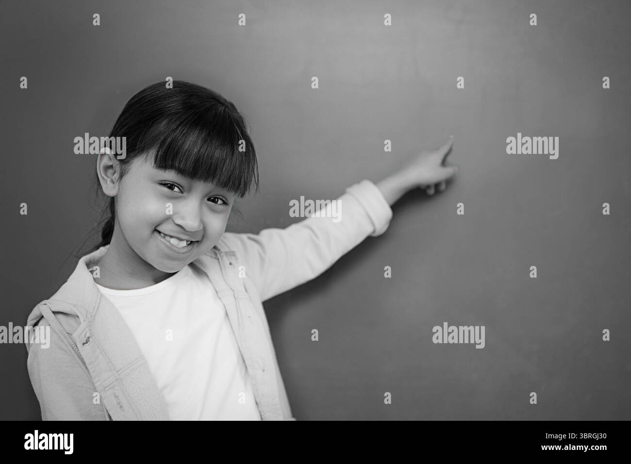 Tableau noir avec écolier Banque D'Images