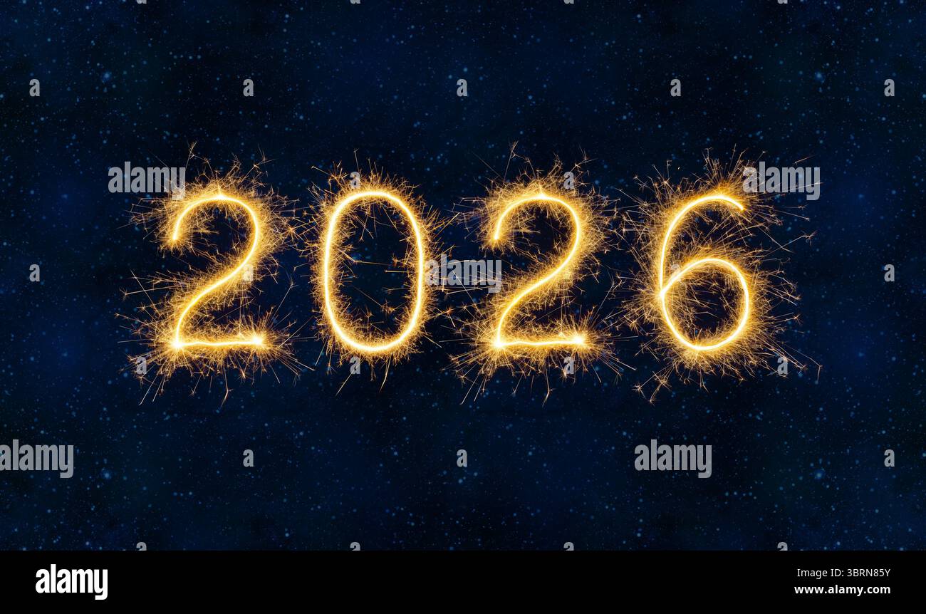 Bonne année 2026 feux d'artifice sur Night Sky Universe en bleu Banque D'Images