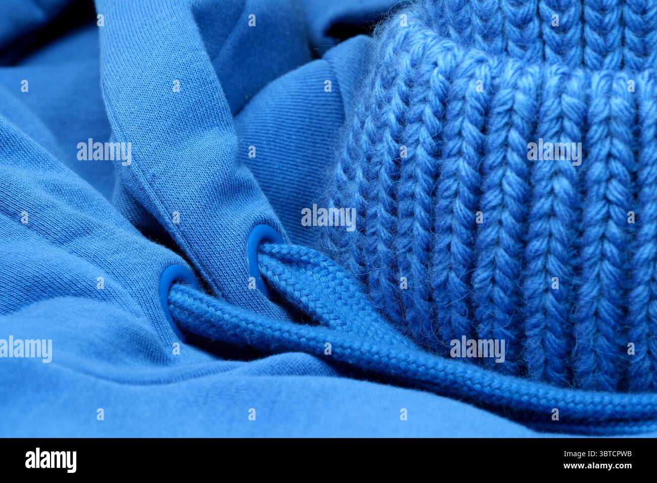 Fond bleu textile Grand tissu de laine tricotée, fond gros plan, macro photographie Banque D'Images