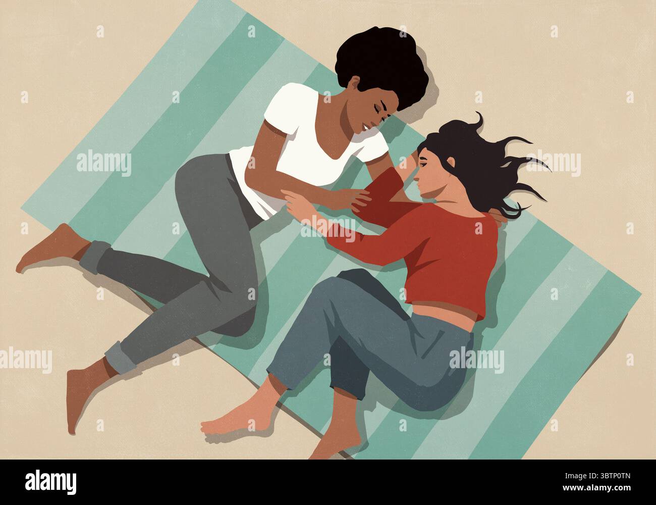 Vue d'en haut de jeune couple lesbien relaxant, câlin sur tapis Banque D'Images