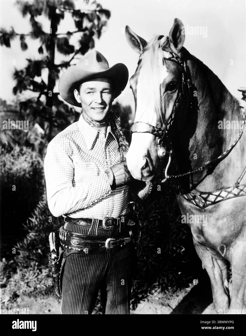 Roy Rogers dans un costume de cow-boy avec un cheval (crédit image : © Movie Star News via ZUMA Press Wire Service) Banque D'Images