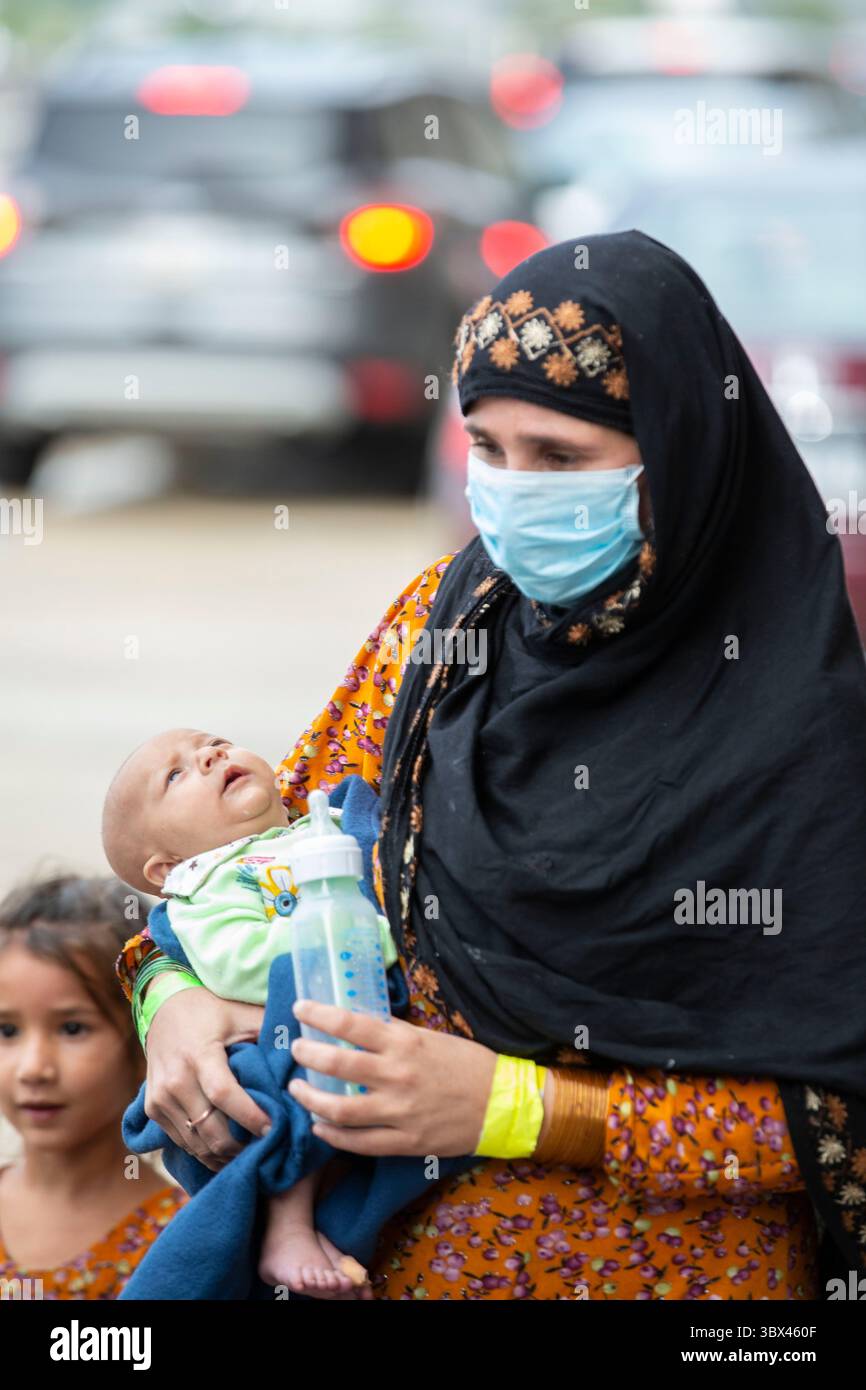 27 août 2021, Munich, Bavière, Allemagne : WASHINGTON DC, États-Unis - AOÛT 27 : les réfugiés afghans évacués de Kaboul arrivent à l'aéroport international Washington Dulles à Washington, DC, États-Unis le 27 août 2021 à Washington DC, USA. (Crédit image : © Ali Khaligh/ATPImages via ZUMA Press Wire) Banque D'Images