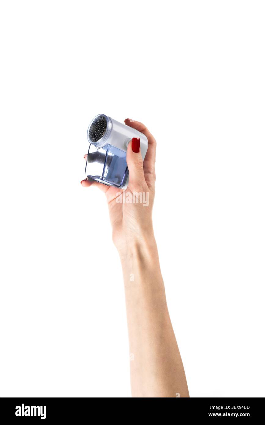 Rasoir électrique moderne en tissu et pull en laine Banque D'Images