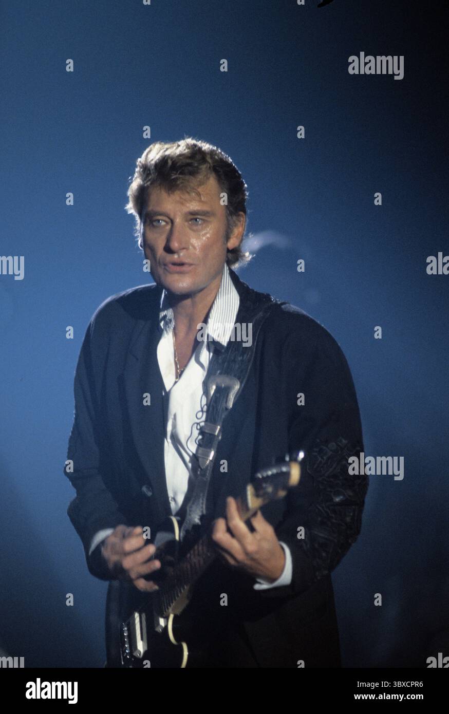 Johny Hallyday chanteur de rock français en concert Banque D'Images
