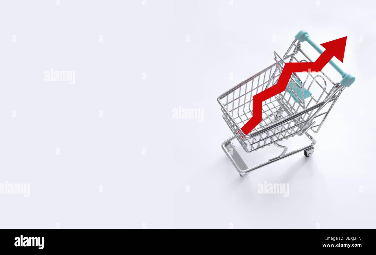Représentation symbolique de l'inflation, de la hausse des prix et du coût élevé de la vie. Flèche montante rouge dans un panier. Chariot à provisions avec flèche rouge. Banque D'Images