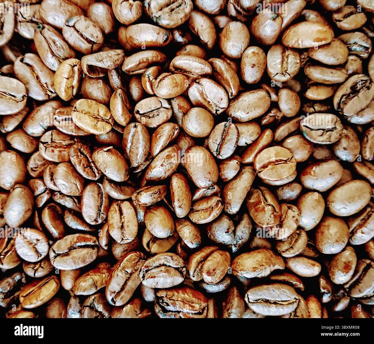 Grains de café rôtis en arrière-plan, vue du dessus Banque D'Images