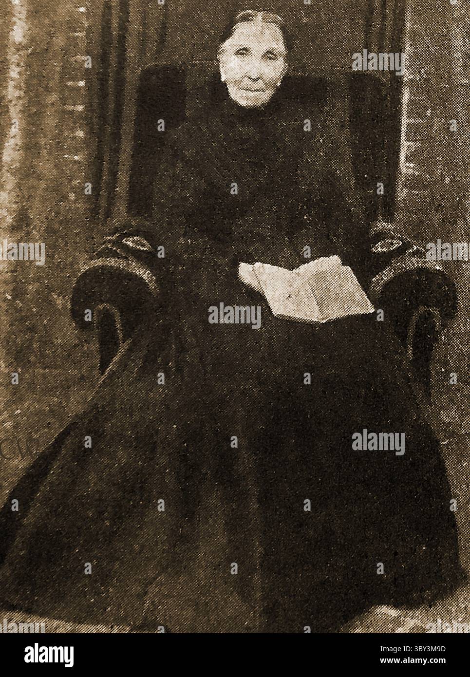 Un portrait imprimé de Mme Cooper était encore en 1915, après 50 ans l'organiste de l'église de jeudi. La chaise lui avait été présentée par les gens de son église afin qu'elle puisse continuer à jouer. Banque D'Images