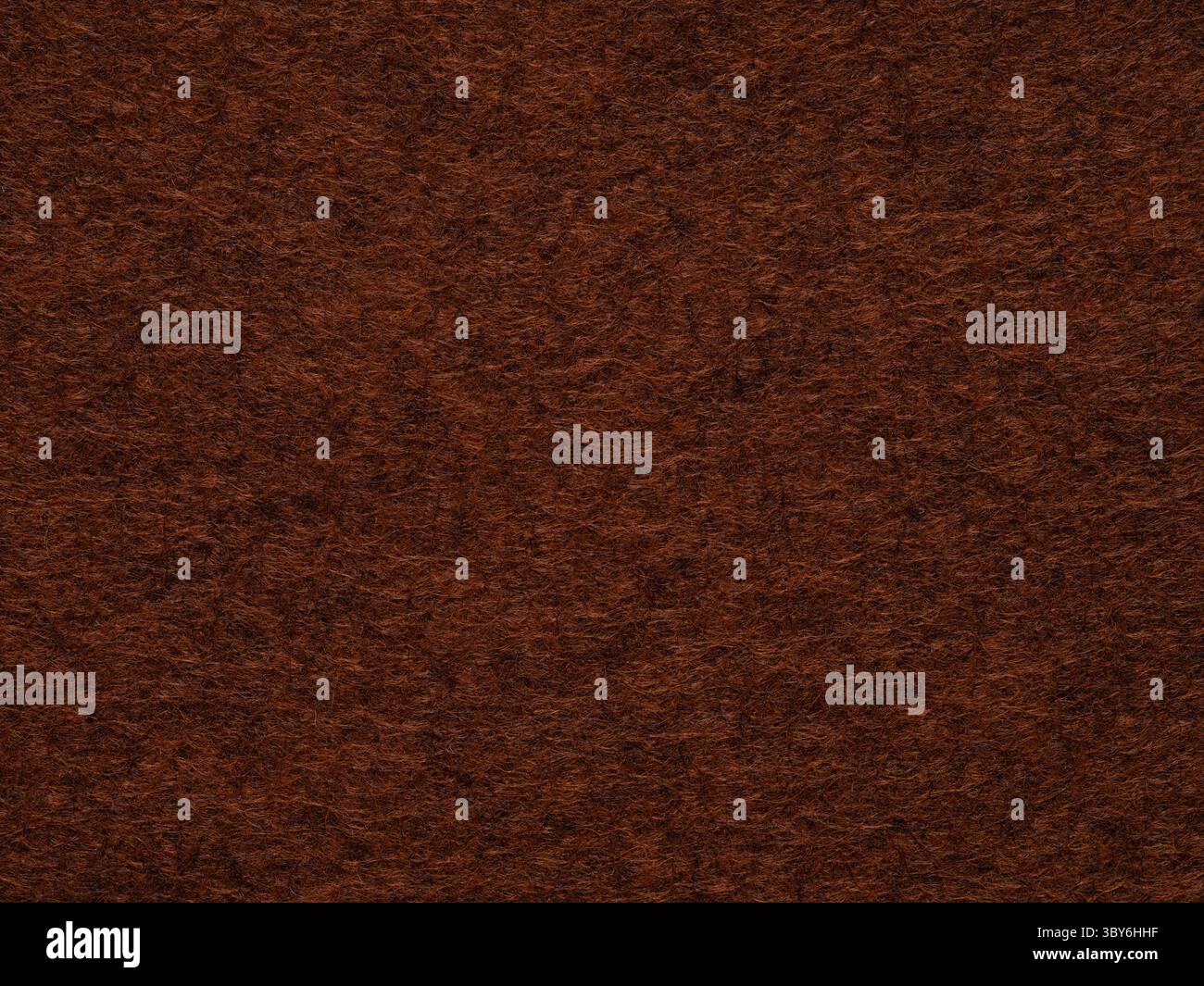 Riche texture feutre d'acajou, évoquant une ambiance de goût raffiné et d'élégance intemporelle. Banque D'Images