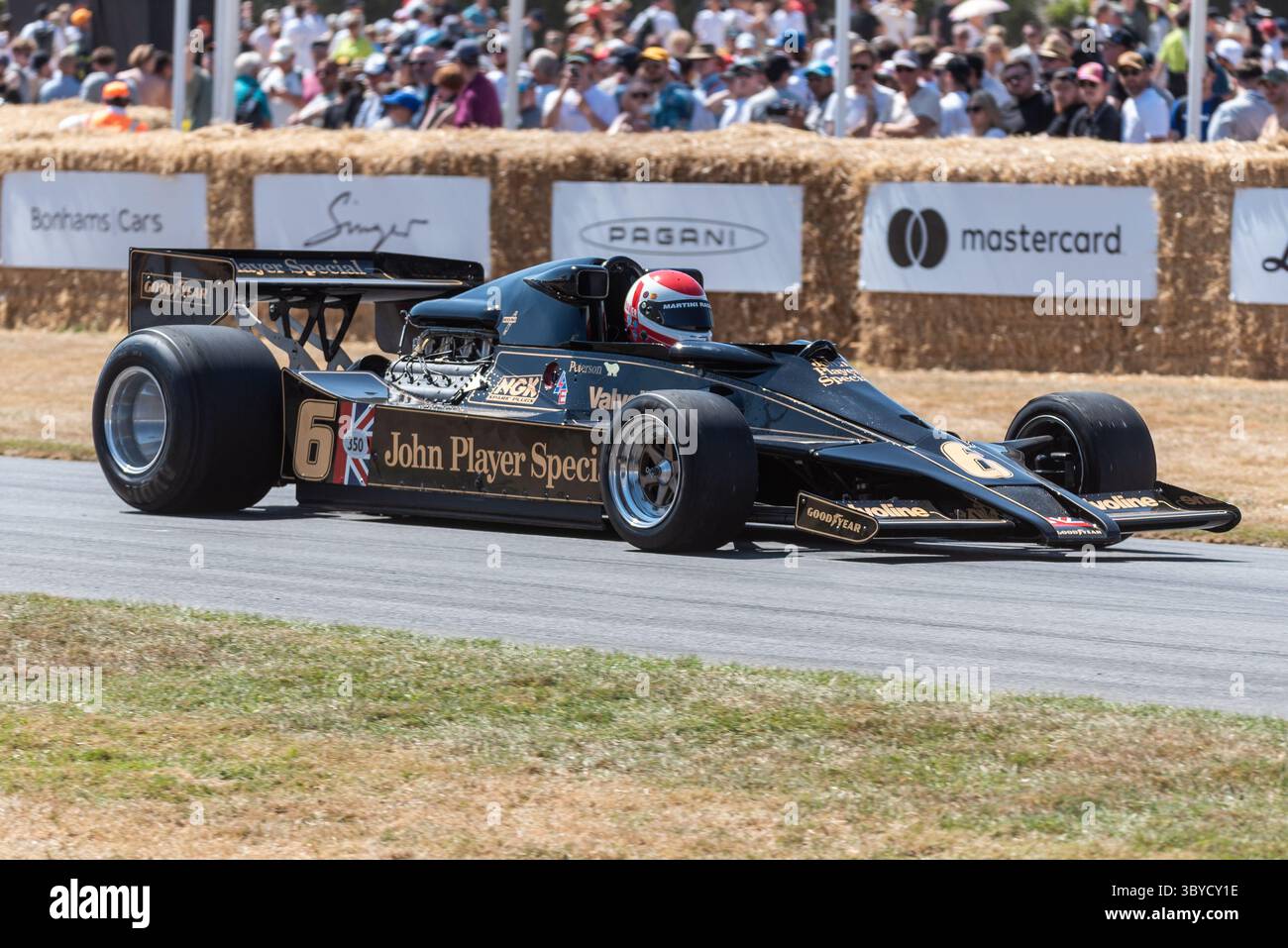 Voiture de formule 1 Lotus 78 remontant la piste de montée de colline lors du Goodwood Festival of Speed 2025 Motorsport and Motoring Event Banque D'Images