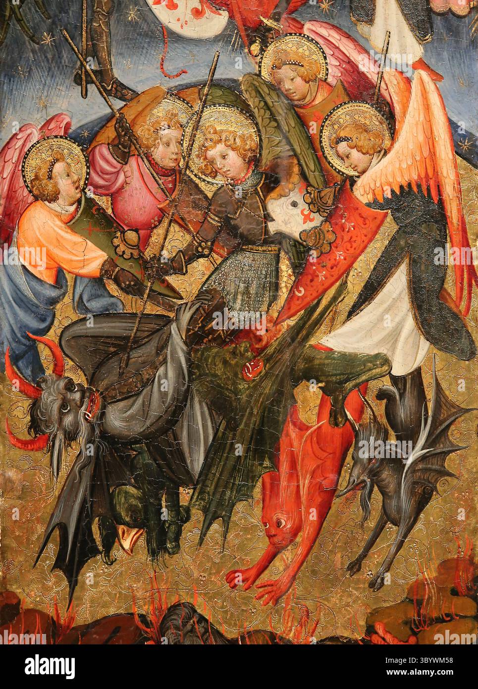 Retable de produit Michael l'Archange. Détail. Bataille entre anges et démons. Tempera, feuille d'or et plaque de métal sur bois. 15e c. MNAC. Espagne. Banque D'Images