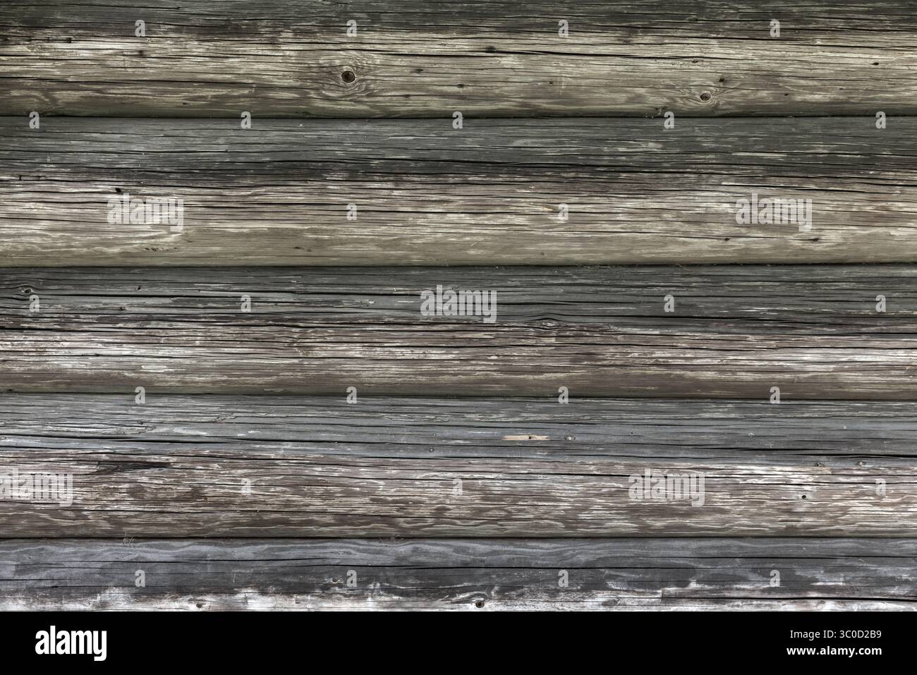 Vue rapprochée détaillée de bûches de bois vieillies, mettant en valeur les textures naturelles et le charme rustique. Fond parfait pour le travail de conception ou les projets créatifs ont besoin Banque D'Images