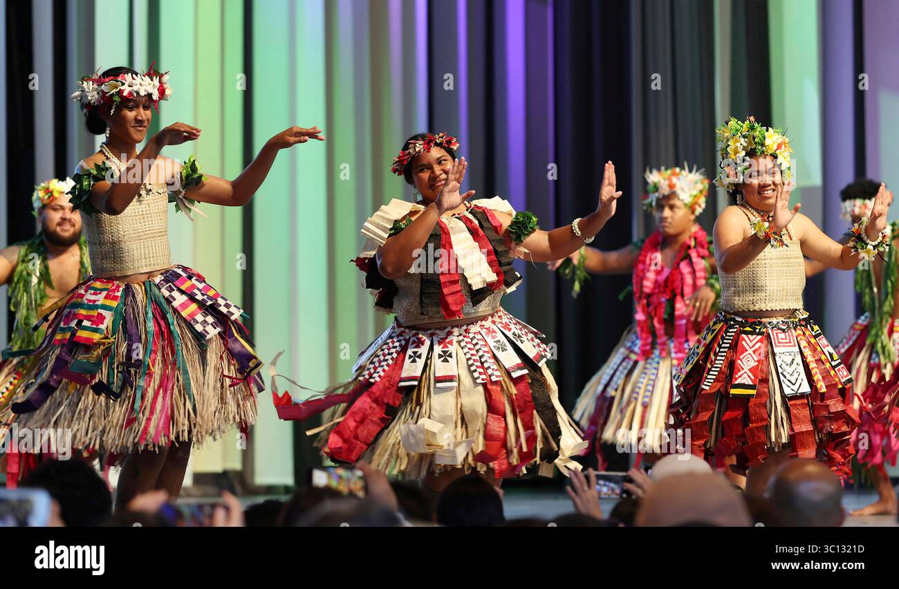 Traditional dance is performed at Tuvalu's National Day ceremony at the Osaka-Kansai Expo on the artificial island of Yumeshima in Konohana Ward, Osaka City, Osaka Prefecture, Japan, on July 22, 2025. ( The Yomiuri Shimbun via AP Images ) Banque D'Images