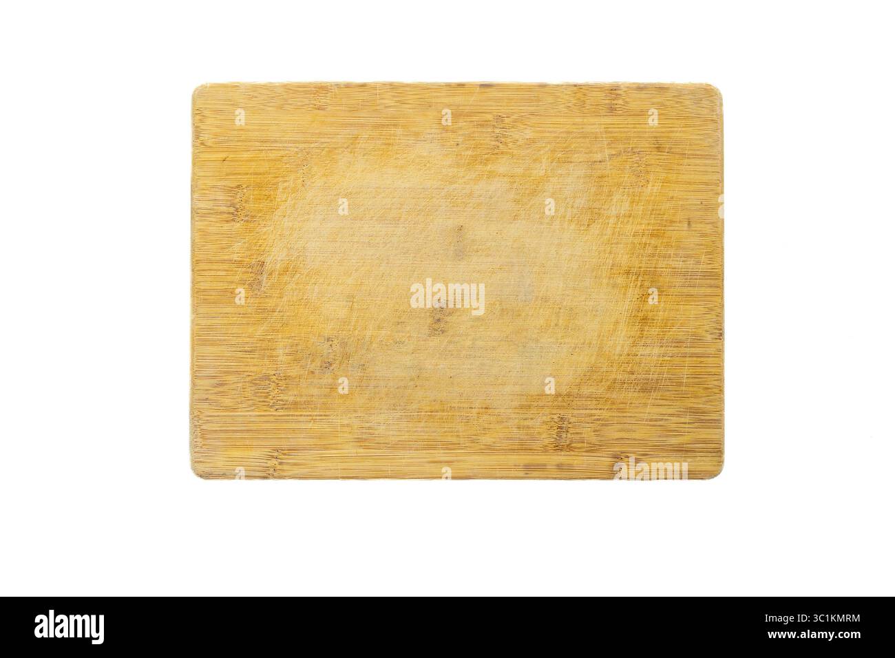 Planche à découper rectangulaire en bois avec des marques de rayures sur fond blanc Banque D'Images