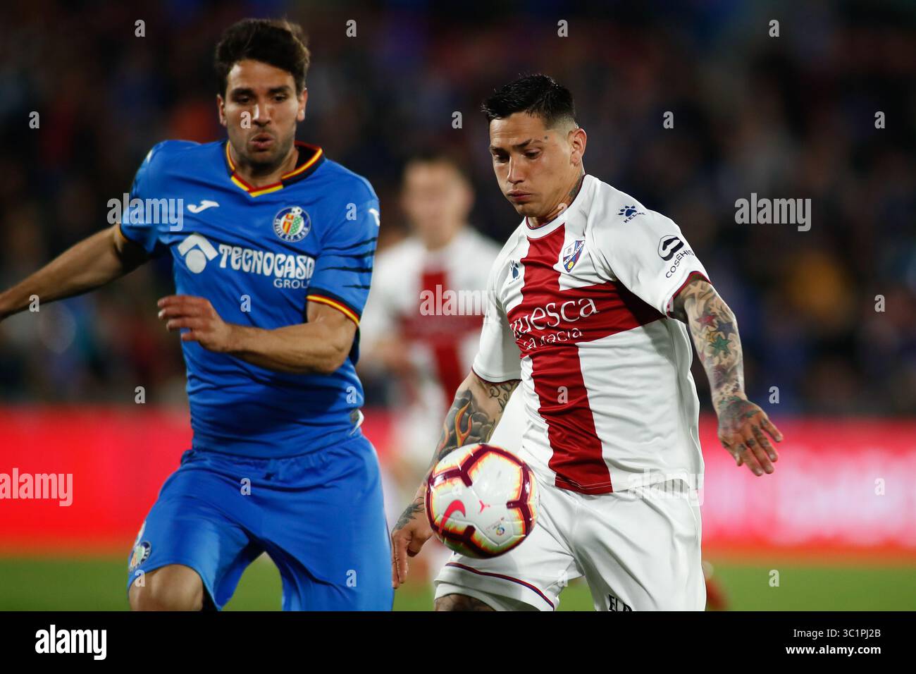 9 mars 2019 - Getafe, MADRID, ESPAGNE - Chimi Avila de Huesca et Cabrera de Getafe CF lors de la ligue espagnole, la Liga, match de football joué entre Getafe CF et SD Huesca au stade Butarque de Getafe, Madrid, Espagne, le 9 mars 2019. (Crédit image : © AFP7 via ZUMA Wire) Banque D'Images