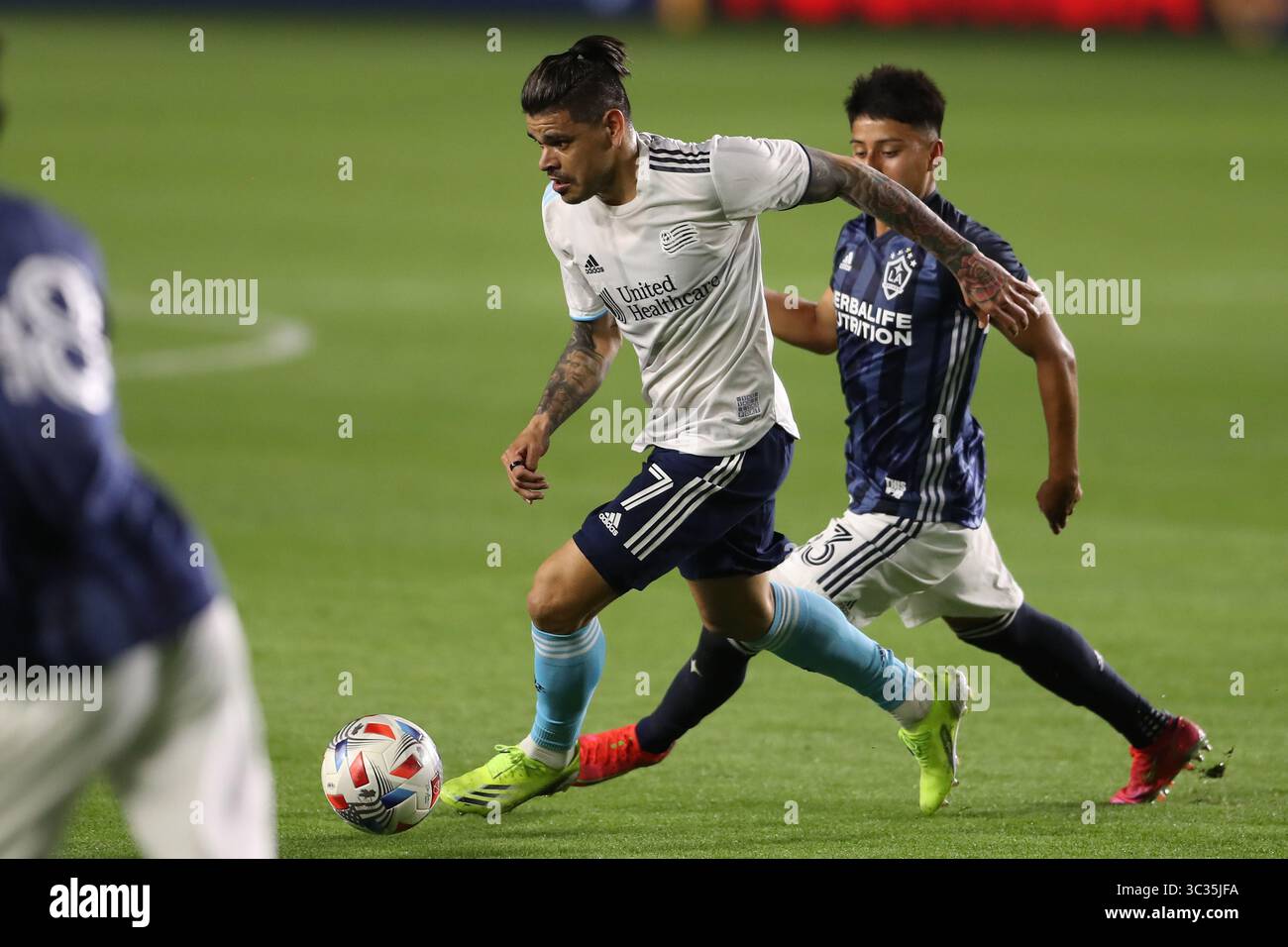 31 mars 2021 : L'attaquant Gustavo Bou (7 ans) de la Révolution de la Nouvelle-Angleterre prend le contrôle du ballon pendant le match entre la Révolution de la Nouvelle-Angleterre et la Galaxie de Los Angeles au Dignity Health Sports Park à Los Angeles, CALIFORNIE, États-Unis. (Photo de Peter Joneleit)(image de crédit : &copy ; Peter Joneleit/CSM via ZUMA Wire) Banque D'Images