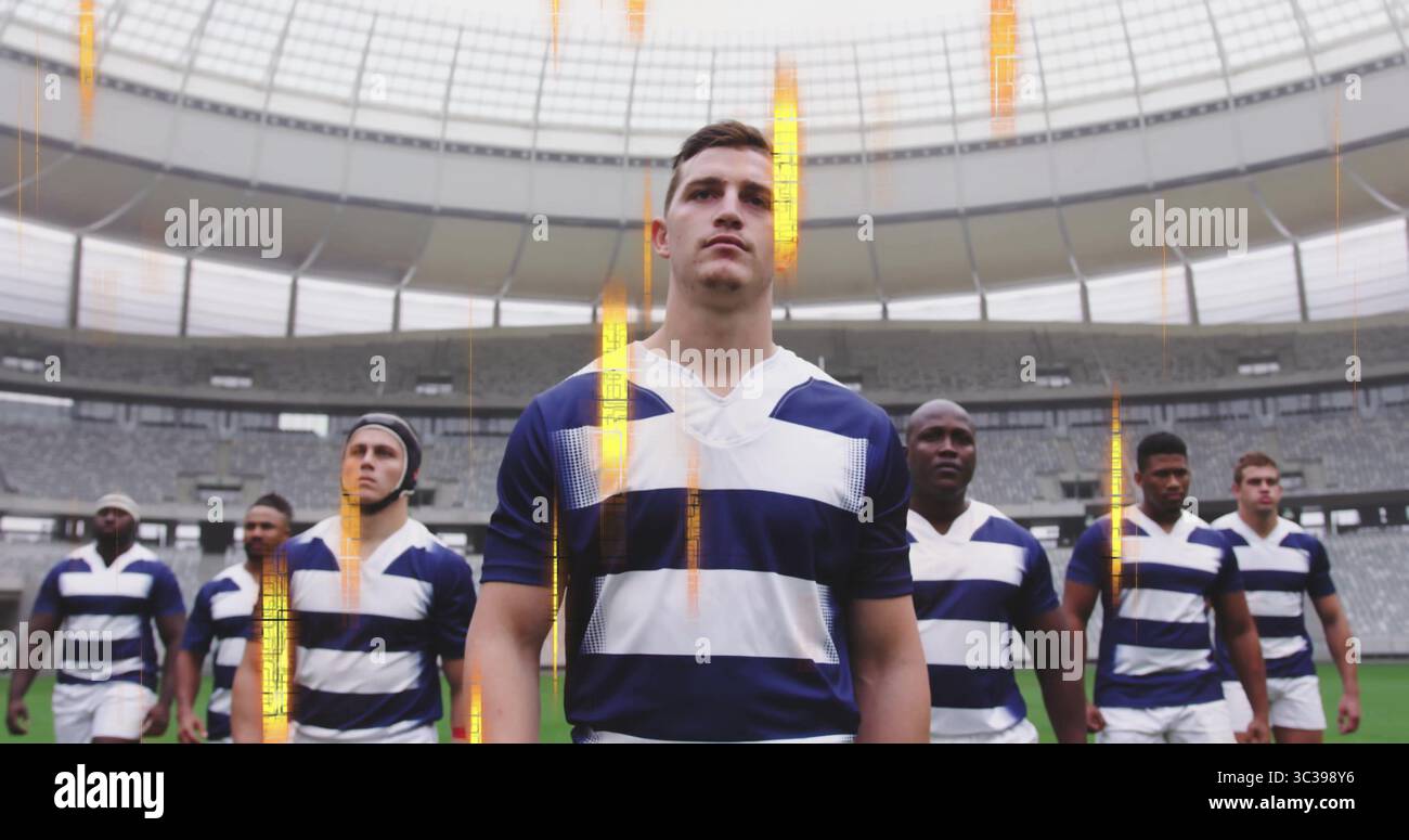 Équipe de rugby de marche portant des maillots à rayures bleu marine, un short blanc sur le terrain du stade, avec bonnet scrum Banque D'Images